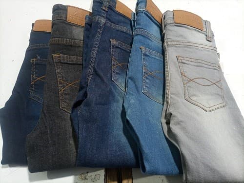 Jeans with branded leather patches, ready for private label